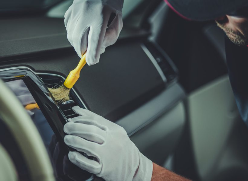 Detailed Car Cockpit Cleaning with a Brush. Vehicle Detailing Work.