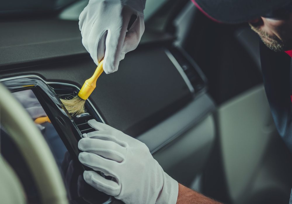 Detailed Car Cockpit Cleaning with a Brush. Vehicle Detailing Work.