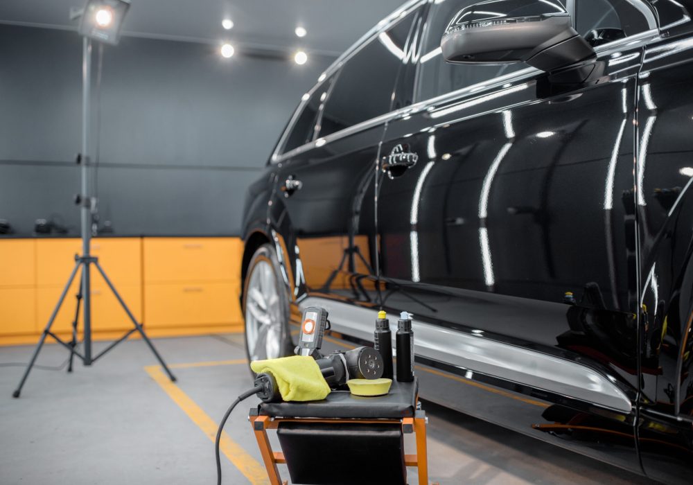 Professional equipment for automotive body polishing at the car service. Car detailing tools for vehicle care
